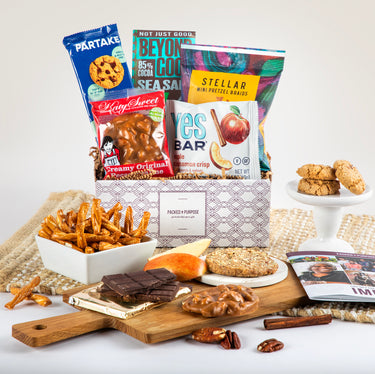 Kosher Gift Basket filled with Partake cookies, Beyond Good chocolate, Stellar mini pretzels, KatySweet pecan praline, Yes Bar and other snacks. Ideal for work colleagues.